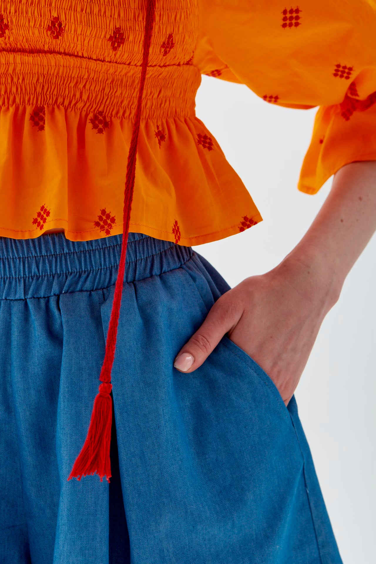 ORANGE TOP WITH EMBROIDERY